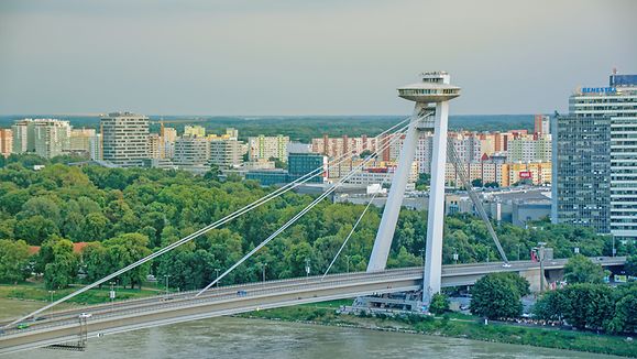 Most SNP (UFO Bridge) in Bratislava, Slovakia at sunset in the summer