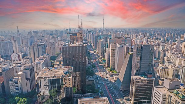 Aerial view of Av. Paulista in São Paulo, SP. Main avenue of the capital. With many radio antennas, commercial and residential buildings. Aerial view of the great city of São Paulo. Sunset