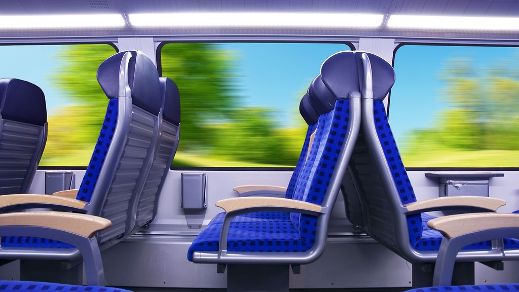 Empty passenger seats inside the regional train