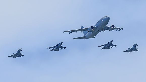 German airforce - military aircraft tanker in a convoy with fighter jets
