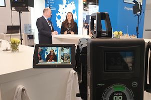 Movie recording with our digital health expert Julia Pietsch joined by Dr. Marcus Schmidt, director of the healthcare team @ GTAI booth (from right to left).