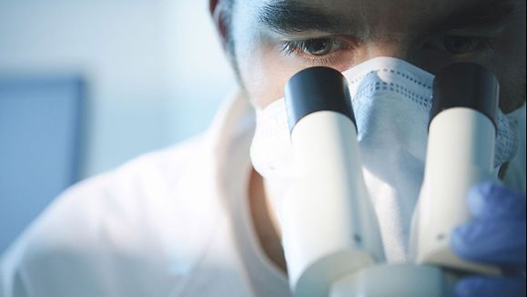 Man with microscope