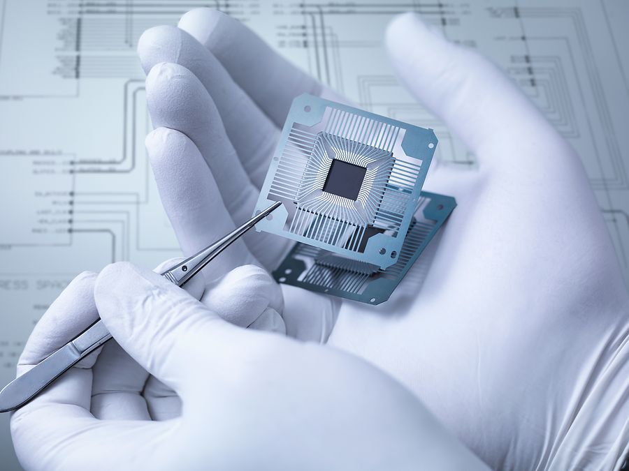 Electronic components held in hand in laboratory, close up| ©Monty Rakusen/Getty Images