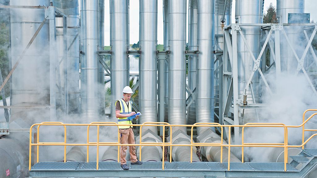 Caucasian worker at geothermal power station