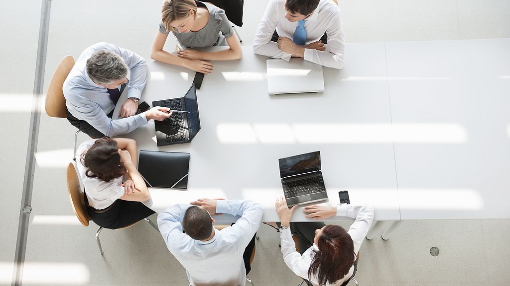 Overhead view of business people in a meeting