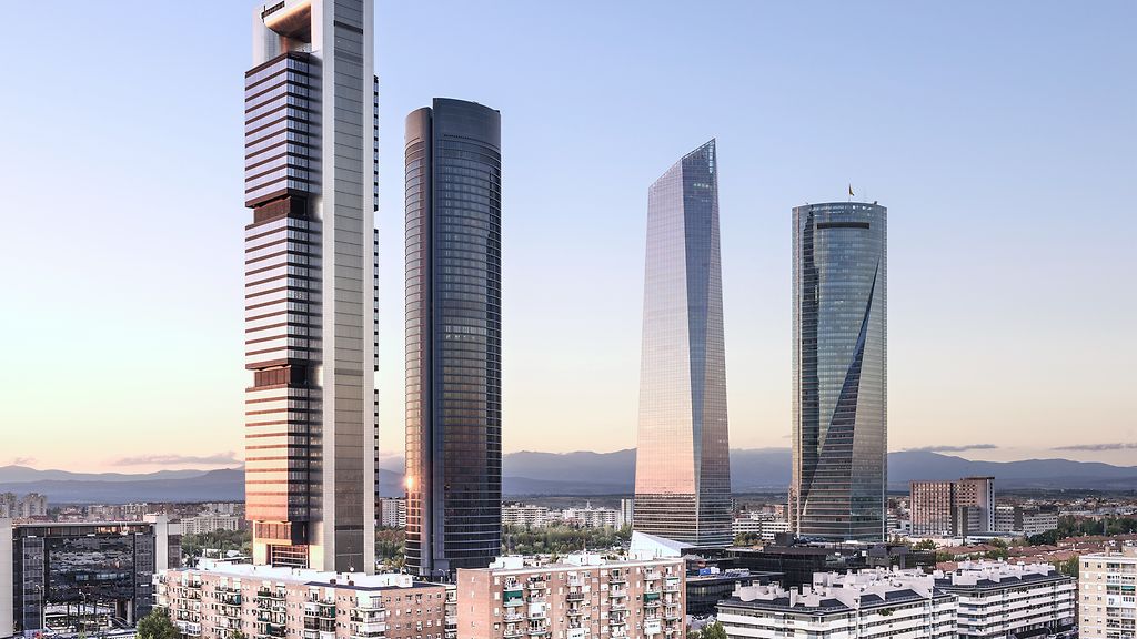 Madrid, Spain financial district skyline at dusk.