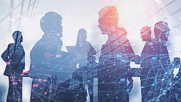 Silhouettes of business people with documents over abstract city background with double exposure of network interface. Concept of teamwork and hi tech. Toned image