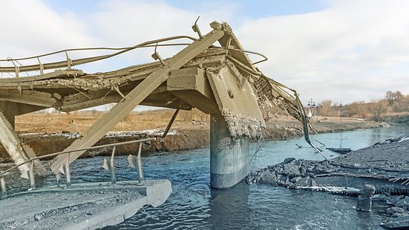 IRPIN, UKRAINE - Mar. 09, 2022: War in Ukraine. Chaos and devastation on the outskirts of Irpen. Damaged bridge as a result of rocket attack and bombardment of a peaceful city