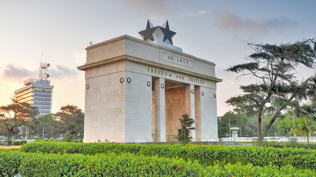 The Independence Arch of Independence Square of Accra, Ghana at sunset. Inscribed with the words "Freedom and Justice, AD 1957", commemorates the independence of Ghana, a first for Sub Saharan Africa. | © demerzel21 - stock.adobe.com